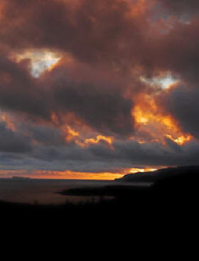 Sunset through storm clouds